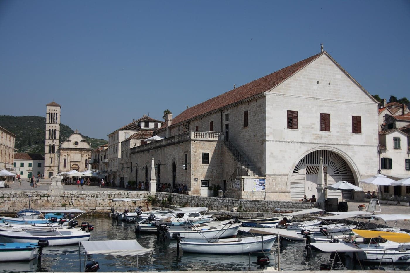 The Arsenal on Hvar's harbour — the stone gate that holds Europe's first public theatre
